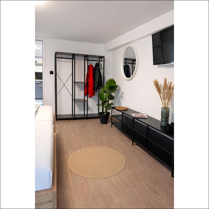 Quartier OG – Gesamtansicht mit Garderobe